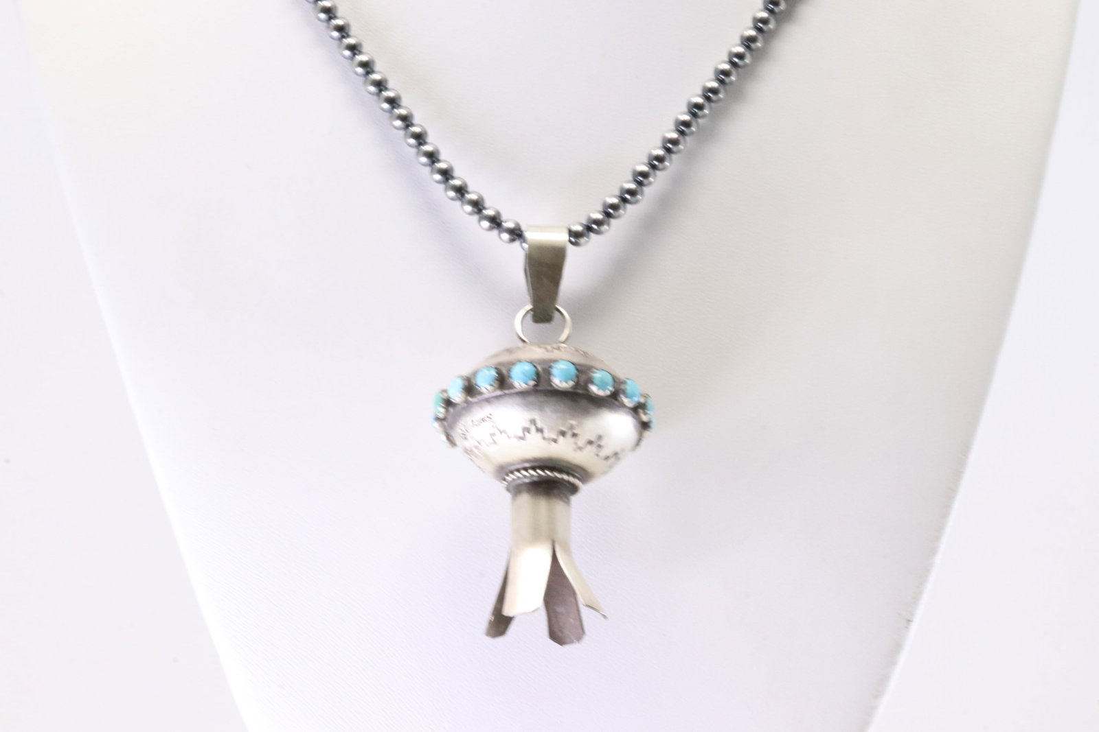 Native America Navajo Sterling Silver Turquoise Pendant By MS With Machine Made Sterling Silver: This is a Native America Navajo Sterling Silver Turquoise Pendant By MS With Machine Made Sterling Silver Pearl Beaded Necklace. Stamp MS. Necklace Length: 18.00.