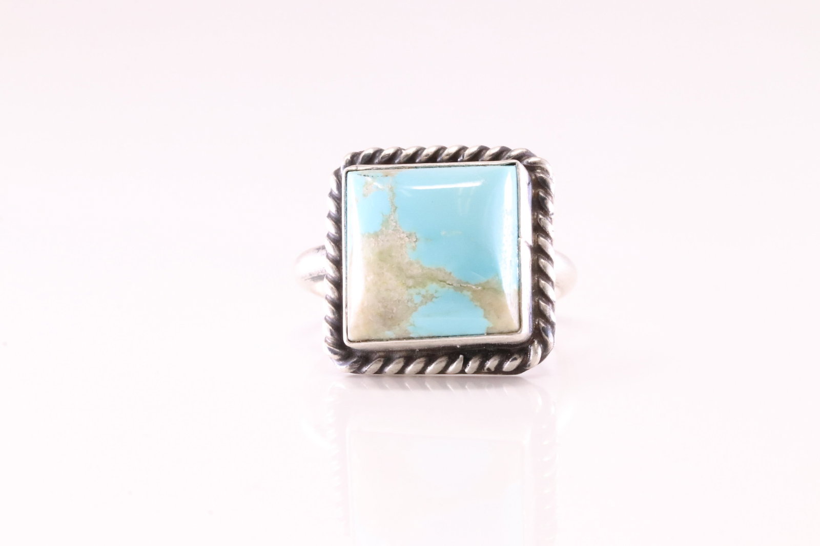 Native America Navajo Sterling Silver Turquoise Ring By J.: This is a Native America Navajo Sterling Silver Turquoise Ring By J. Ring size: 7.00.