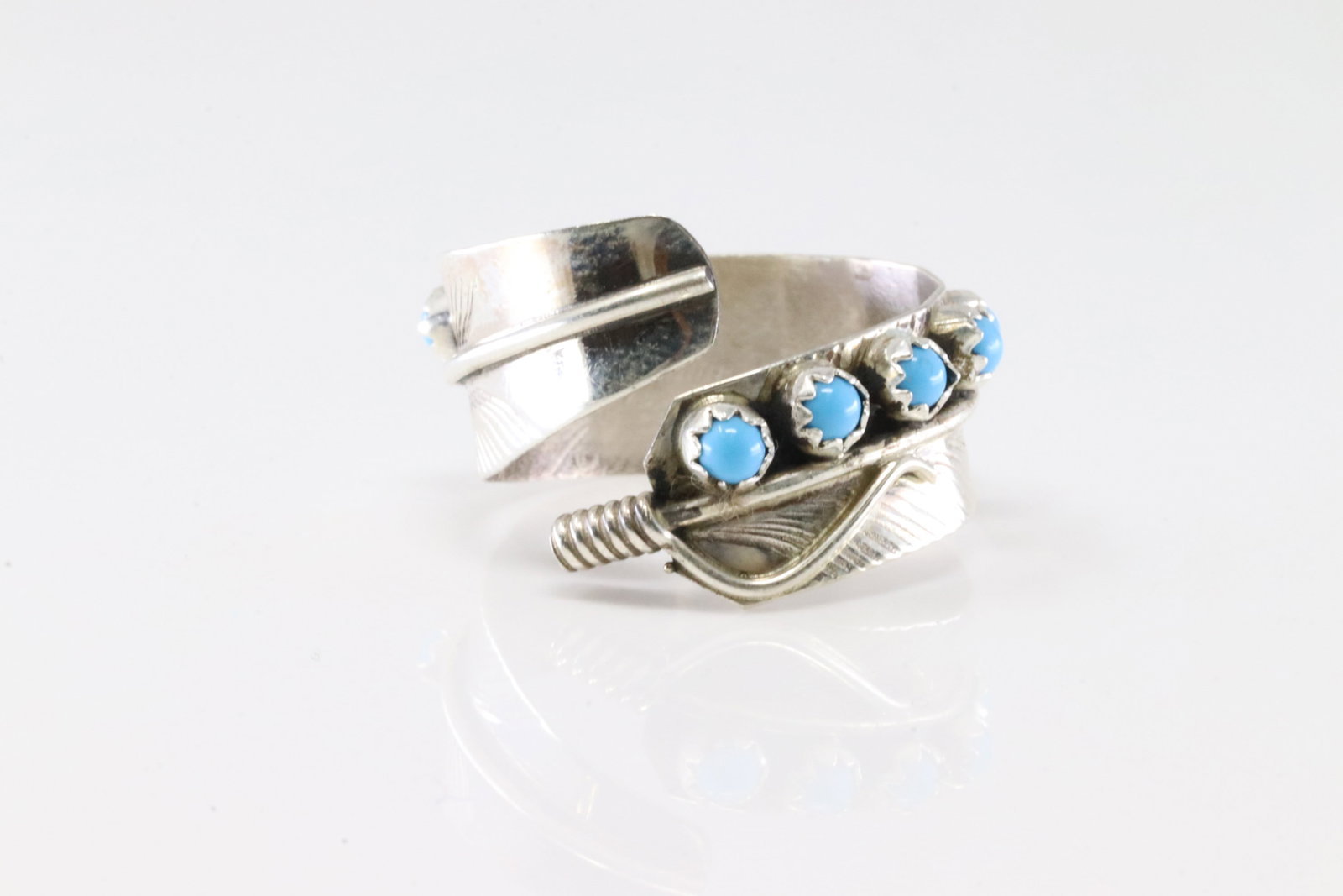 America Sterling Silver Turquoise Feather Ring.: This is a America Sterling Silver Turquoise Feather Ring. Ring size: 9.25.