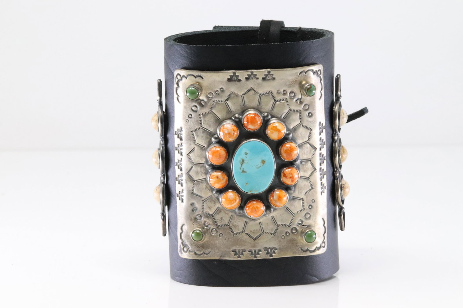 Wide Native America Sterling Silver Multi-Color Stoine Leather Bracelet.: This is a Wide Native America Sterling Silver Multi-Color Stoine Leather Bracelet. Bracelet length: 9.00"