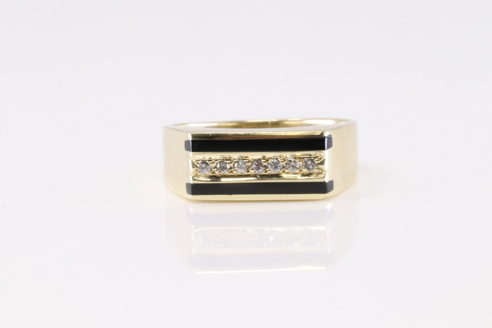 Elegant Black Onyxc & Diamond Ring 14Kt.: 14Kt Yellow Gold Black Onyx & Diamond Ring. This Elegant Ring has Black Onyx with Sparkling Diamonds. Ring size: 11.00. Total weight: 9.08 Grams.