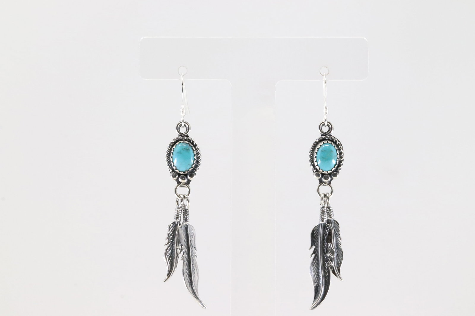 America Sterling Silver Turquoise Feather Dangling Earring's.: This is a America Sterling Silver Turquoise Feather Dangling Earring's.
