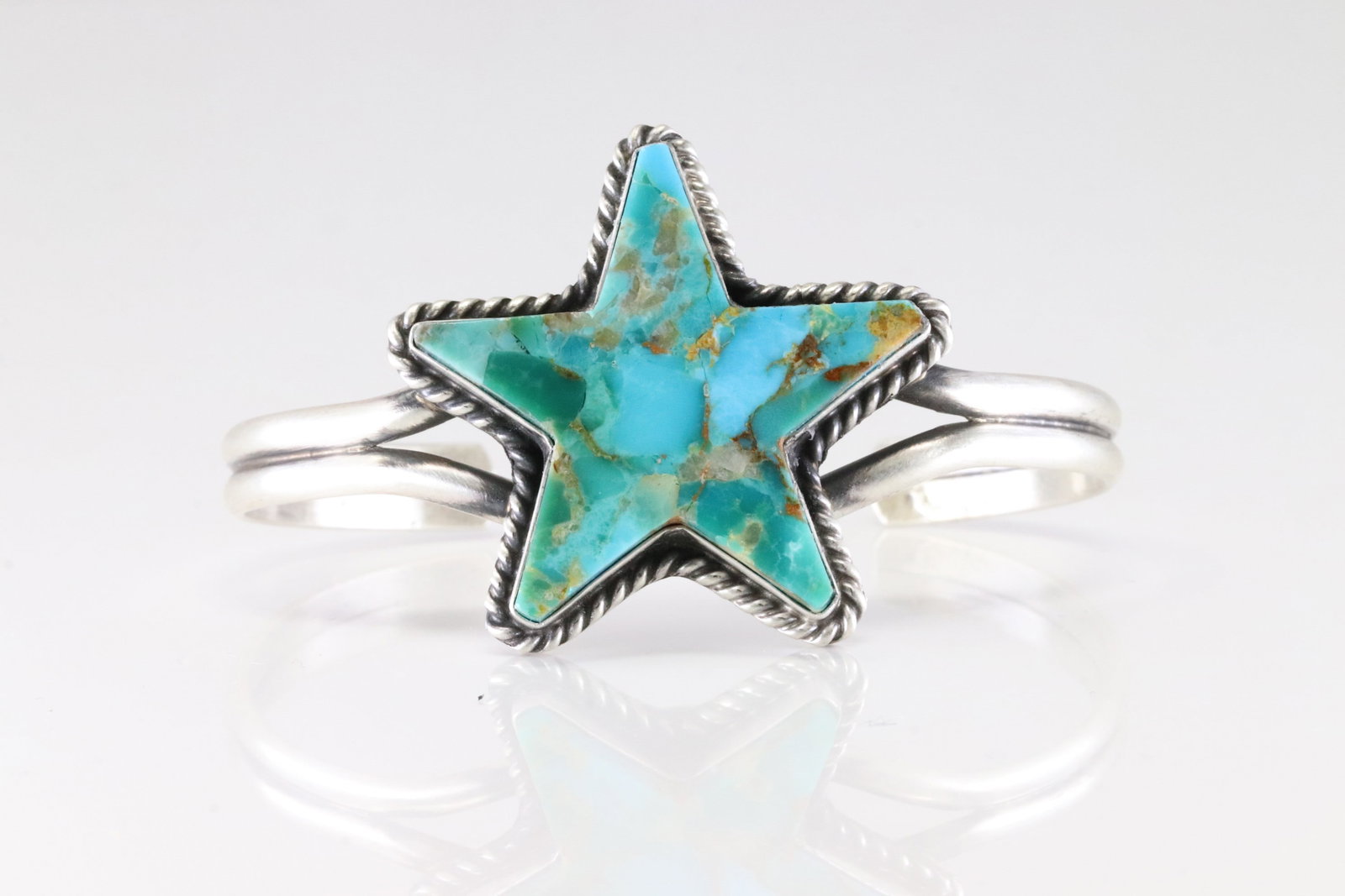 Native America Navajo Sterling Silver Kingman Turquoise Star Bracelet Cuff By L.C.: This is a Native America Navajo Sterling Silver Kingman Turquoise Star Bracelet Cuff By L.C.