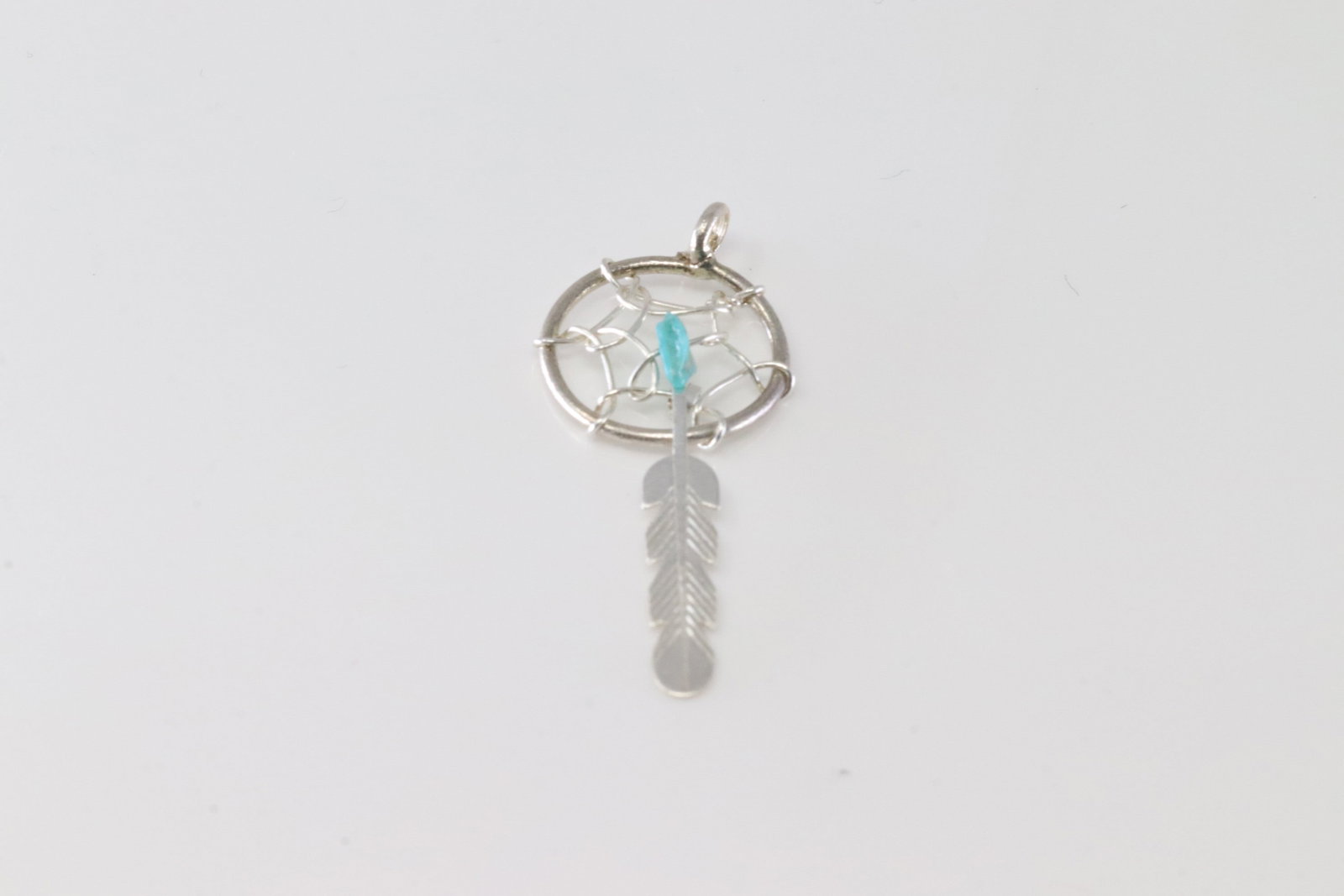 America Sterling Silver Turquoise Dream Catch Pendant.: This is a America Sterling Silver Turquoise Dream Catch Pendant.
