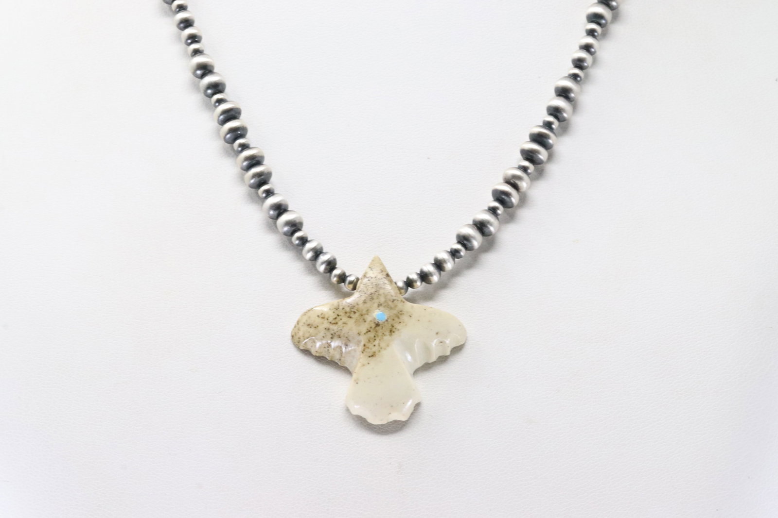 America Stingray Turquoise & Brow Stone Pendant with Pearl Beaded Sterling Silver Machine Made: This is a America Stingray Turquoise & Brow Stone Pendant with Pearl Beaded Sterling Silver Machine Made Necklace. Necklace length: 20.00"