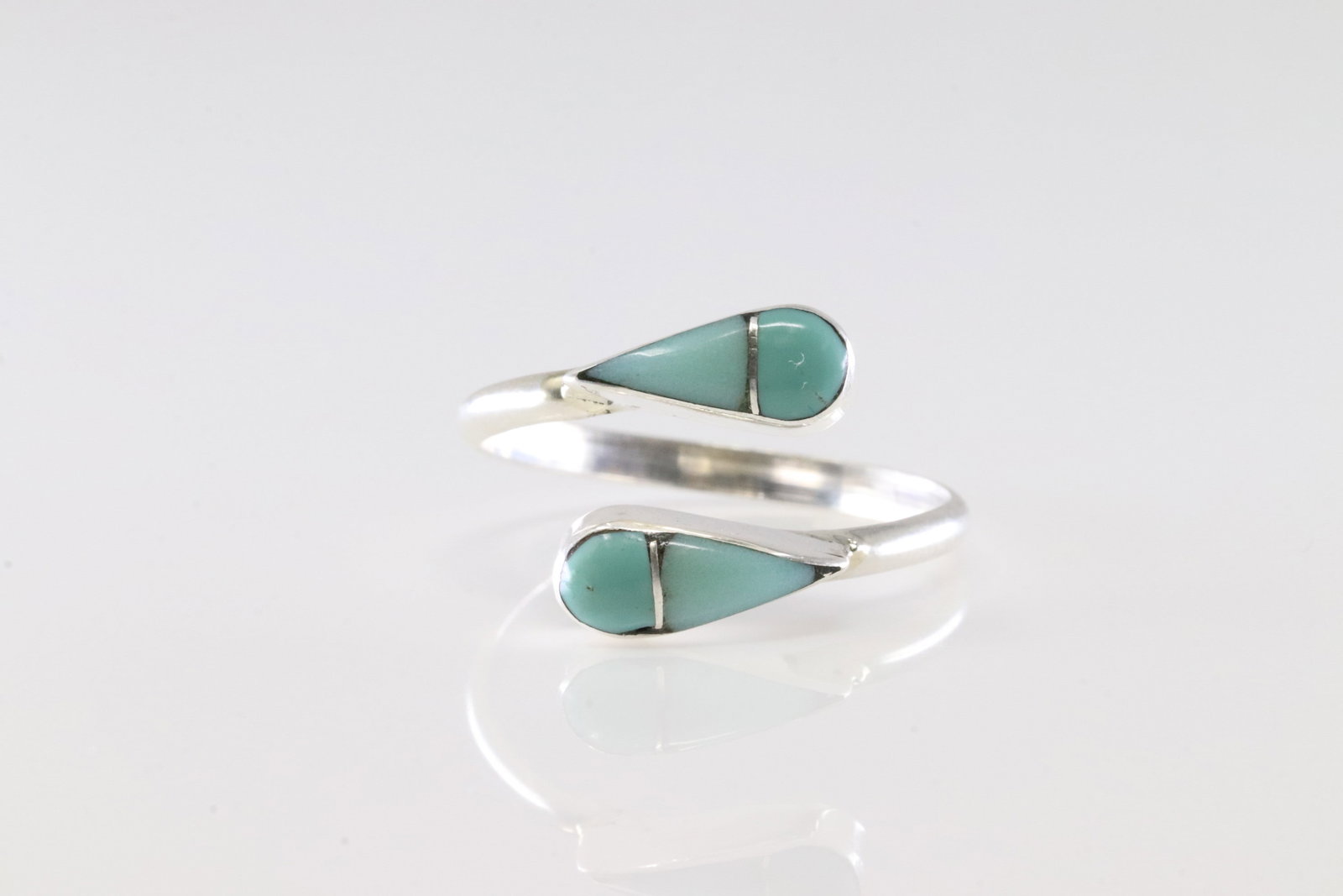 Native America Zuni Sterling Silver Turquoise Inlay Ring By R.V.N.: This is a Native America Zuni Sterling Silver Turquoise Inlay Ring By R.V.N. Ring size: 8.50.