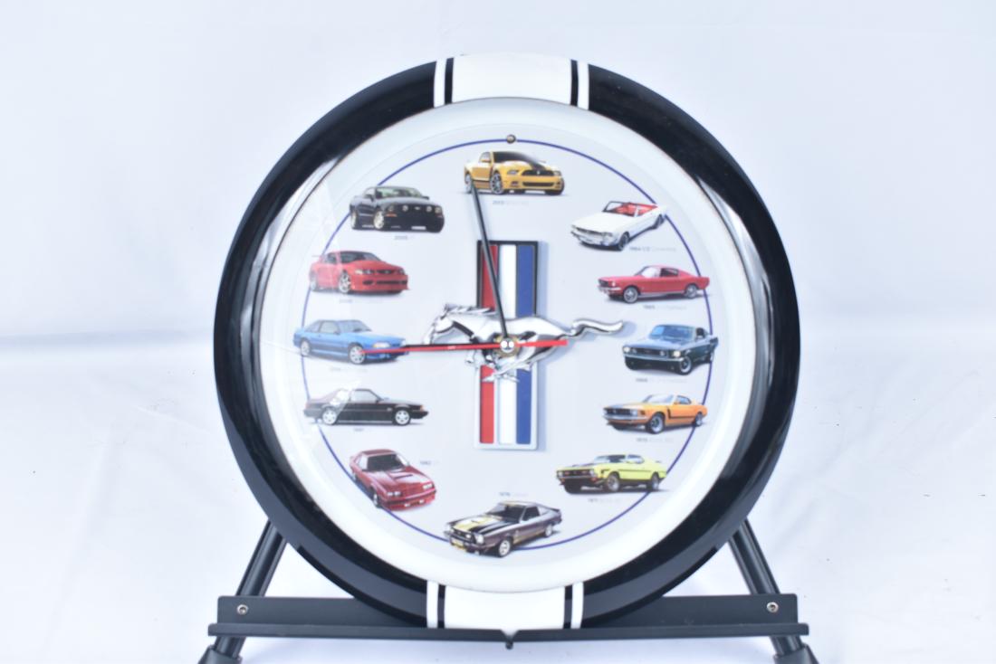 Ford Mustangs Clock: Ford Mustangs Clock SIZE: 13" diameter