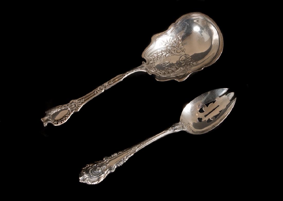 A lot of two sterling serving spoons (1 of 5)