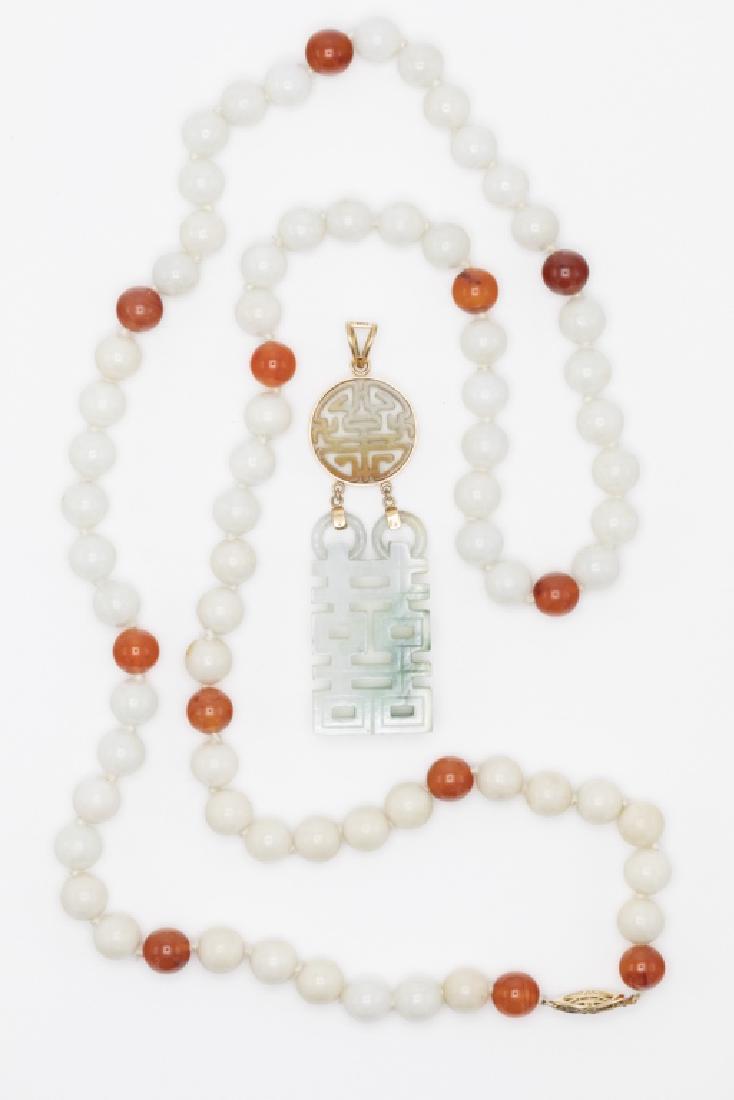 A collection of jade, carnelian, 14k jewelry items: Including one jadeite and carnelian bead, 14k, yellow gold 31 inch necklace; together with a carved and pierced jade shou symbol double drop 14k pendant, measuring approximately 80.3 x 22.7 mm. Gross 
