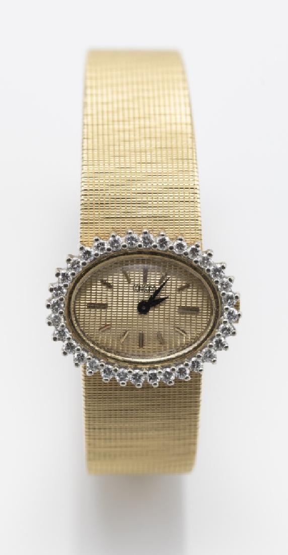 A Concord ladies diamond, 18k wristwatch: DIAL: Oval, textured gold, applied gold index markers, black alpha hands, Concord. MOVEMENT: Manual wind, seventeen (17) jewels, unadjusted, Swiss, Concord Watch Co, CASE: Oval, 14k yellow gold snapba