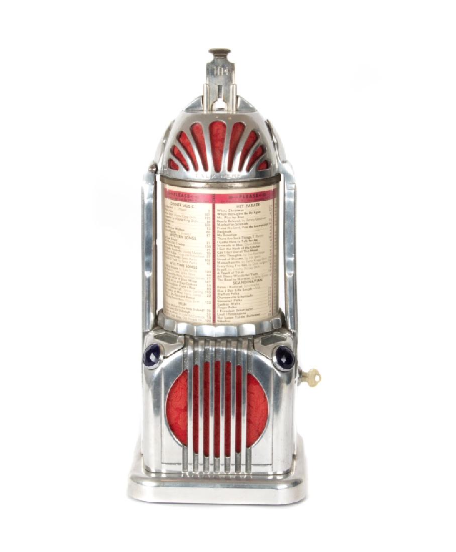 A Shyvers Multiphone Art Deco juke box: Circa 1938. Serial no. 243. 19in. H Footnote to a fascinating decade in musical history: In the 1930's most juke boxes had a selection limited to fifty tunes. The Shyvers Multiphone had a choice of tw