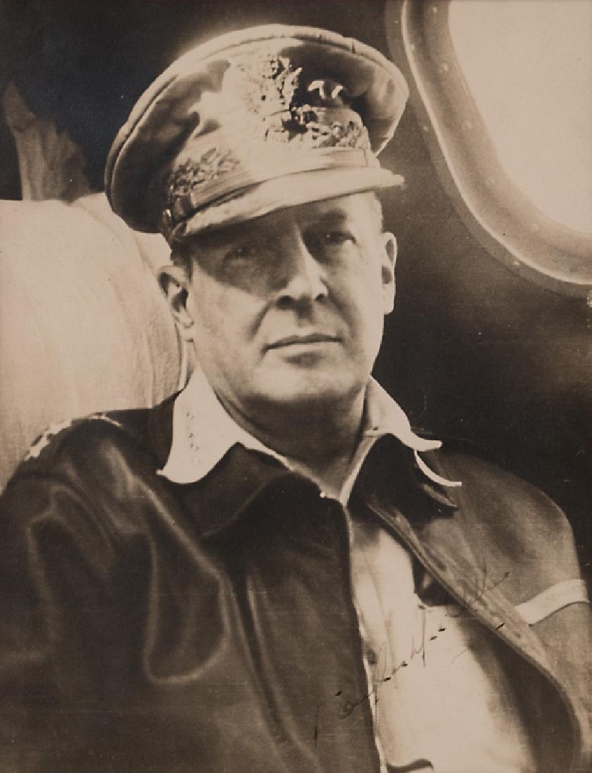 A Douglas MacArthur autograph: Signed photograph of the American general in military attire. Framed: 15in. H x 13in. W. Provenance: The Kenneth W. Rendell Gallery (NBN 36)