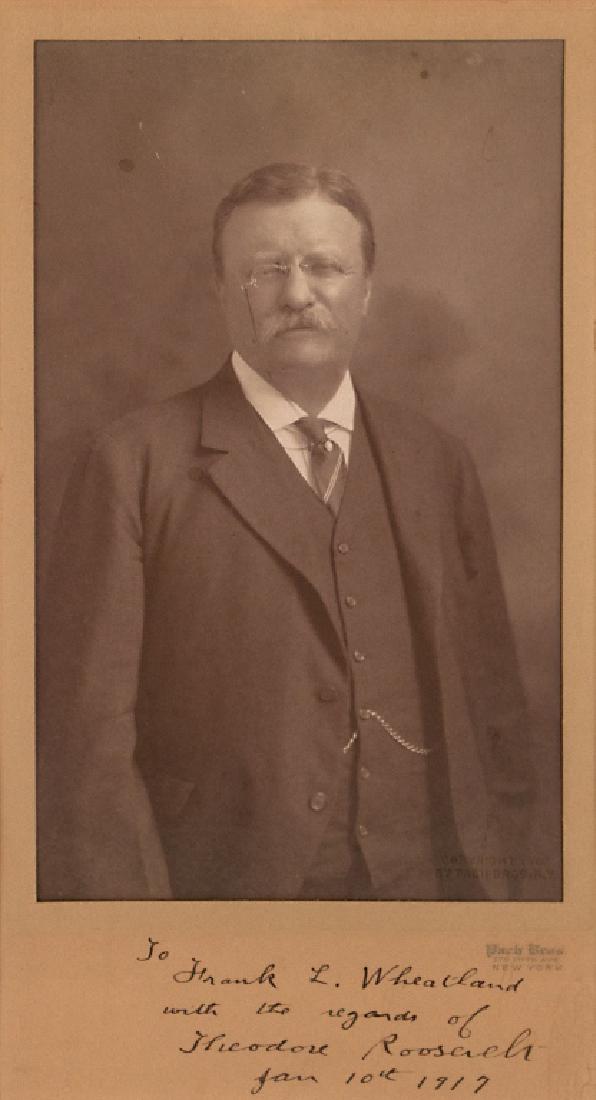 A Theodore Roosevelt autograph: Portrait photograph of the President by Pach Brothers, signed and inscribed on the lower mount 'To Frank L. Wheatland with the regards of Theodore Roosevelt, Jan 10, 1917'. Framed: 11 1/2in. H x 6 1/2