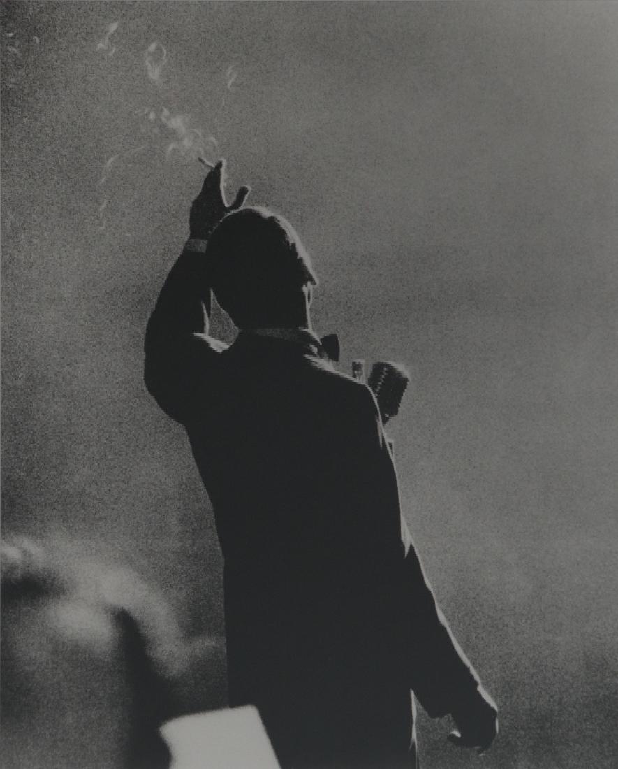 Herman Leonard (American, 1923-2010): Frank Sinatra, Monte Carlo, 1958. Selenium-toned gelatin silver print, printed 1998, signed in ink on the verso, framed. 12 in. H x 9 1/2in. W (image) Provenance: Peter Fetterman Gallery, Santa Monica