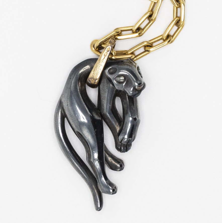 A Cartier Panthere Cartier silver, 18k necklace (1 of 4)