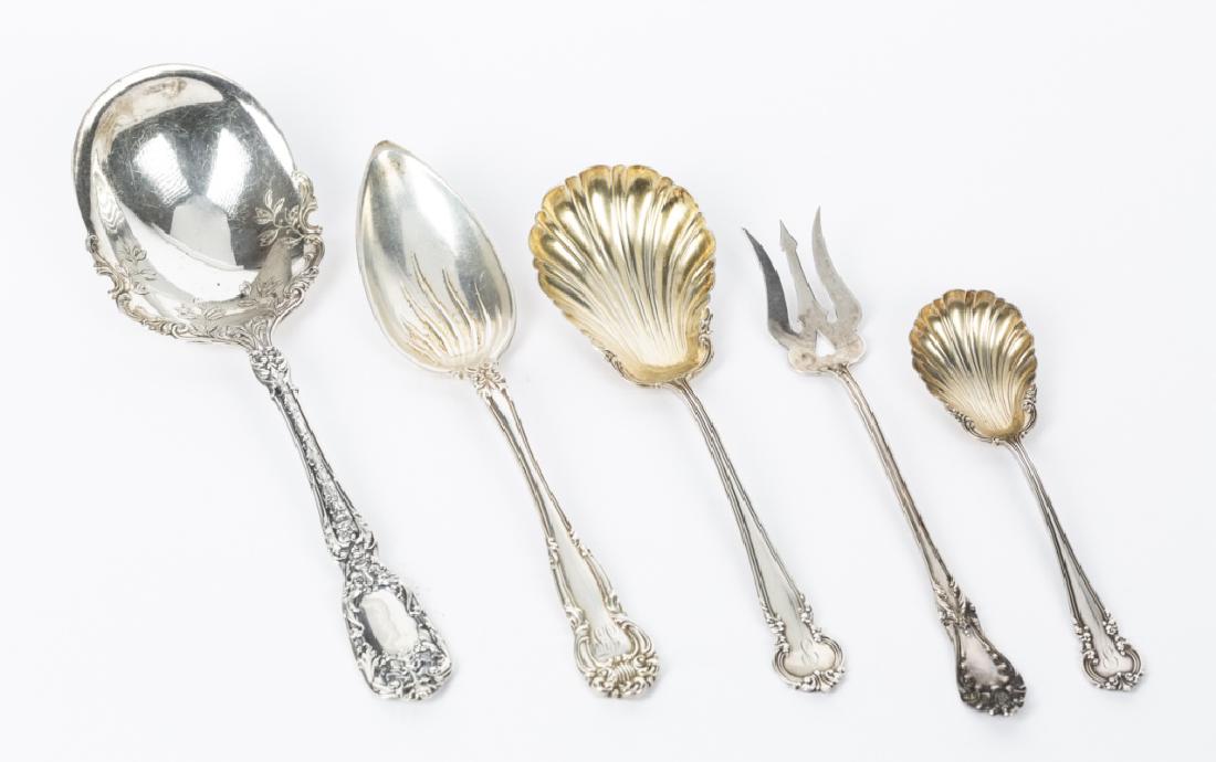 A group of five sterling flatware service pieces (1 of 5)