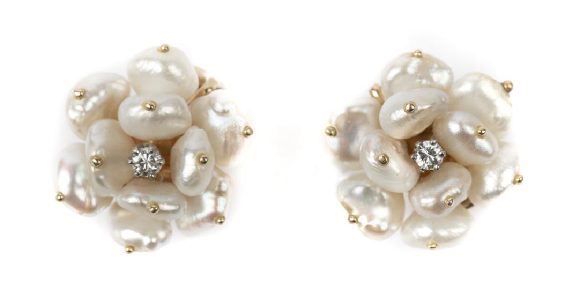 A pair of fresh water pearl, diamond, 14k earrings (1 of 3)