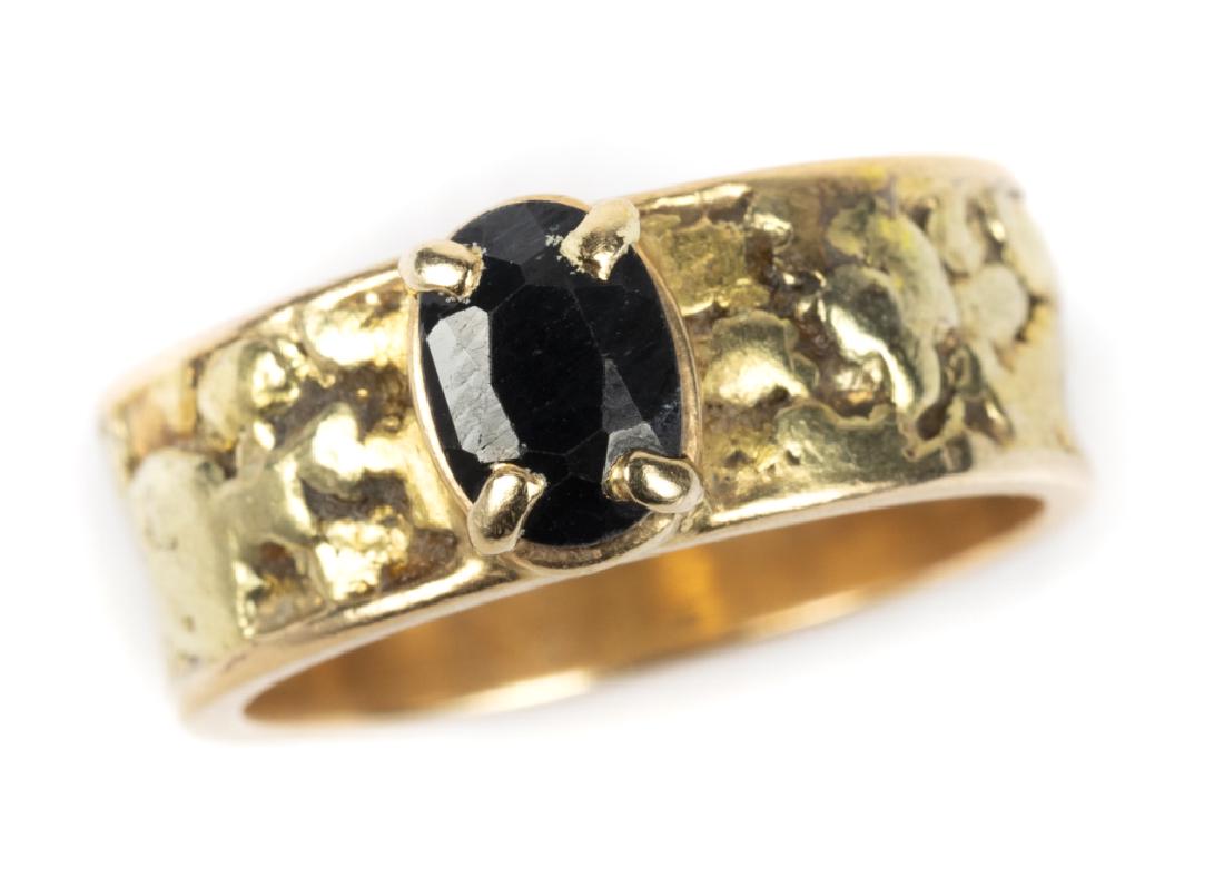 A sapphire, 14k yellow gold nugget style ring (1 of 3)