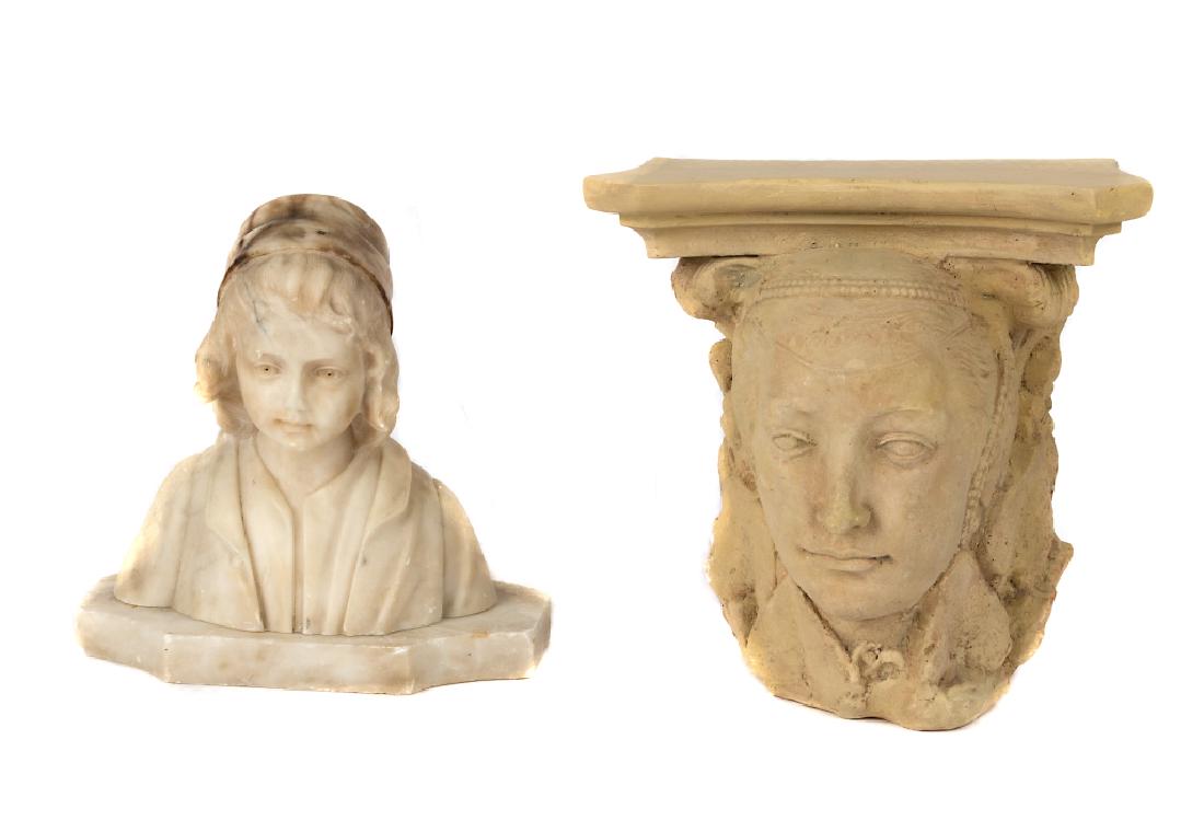 A carved marble figure of a young boy (1 of 5)