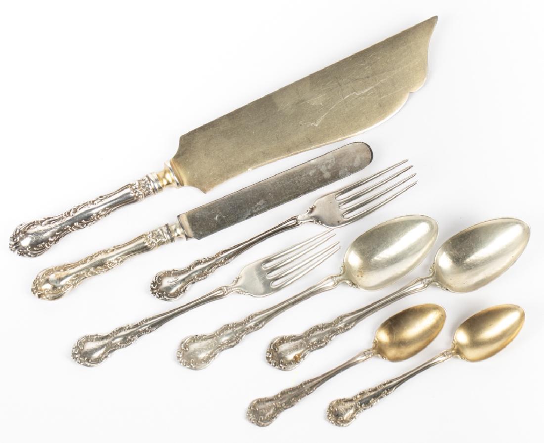 A Wallace Irving sterling part flatware set: Wallace Silversmiths Inc., Wallingford, CT, Irving, assembled with mixed monograms, comprising: 13-7 in forks, 2 teaspoons, 5 small teaspoons with gilt bowls, 6 dessert spoons, 3 tablespoons, [34.05 o