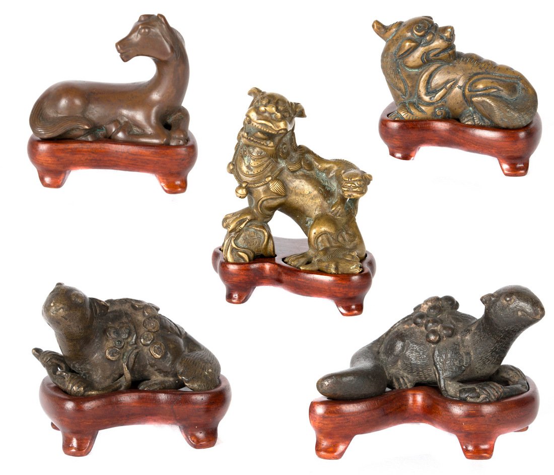 Five Chinese bronze 'beast' paperweights (1 of 8)