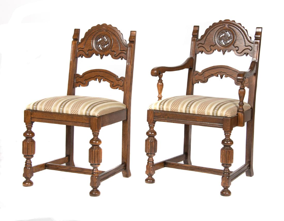 Set six Gothic revival chairs early 20th century: Comprising one armchair and five side chairs, each with arched crest carved with pierced trefoil. 38in. H x 24in. W x 18in. L