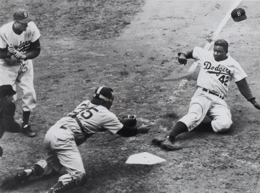 New York Times/Publisher: Jackie Robinson steals home at Ebbets Field, 1952 Giclee archival acid-free semi-matte photo paper, framed. 8 1/2in. H x 11 1/2in. W (image) Frame: 18 1/2in. H x 21in. W x 1in. L