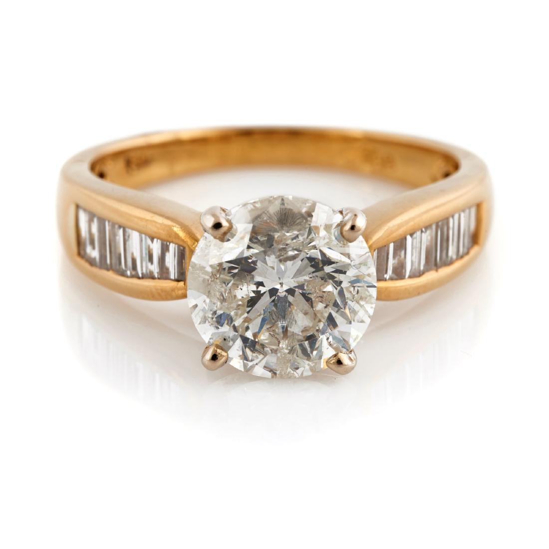 A diamond, 18k yellow gold ring (1 of 2)