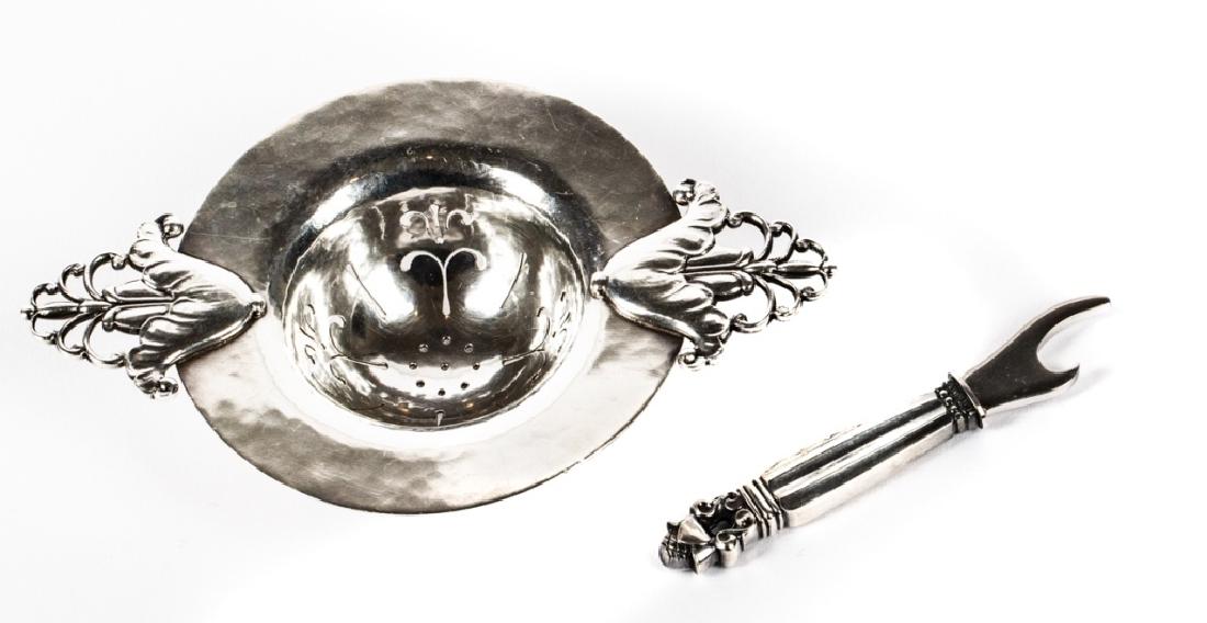 A Georg Jensen sterling tea strainer and bottle opener (1 of 4)