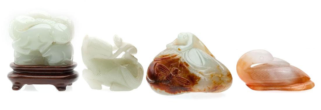 Four Chinese jade animal form toggles (1 of 5)