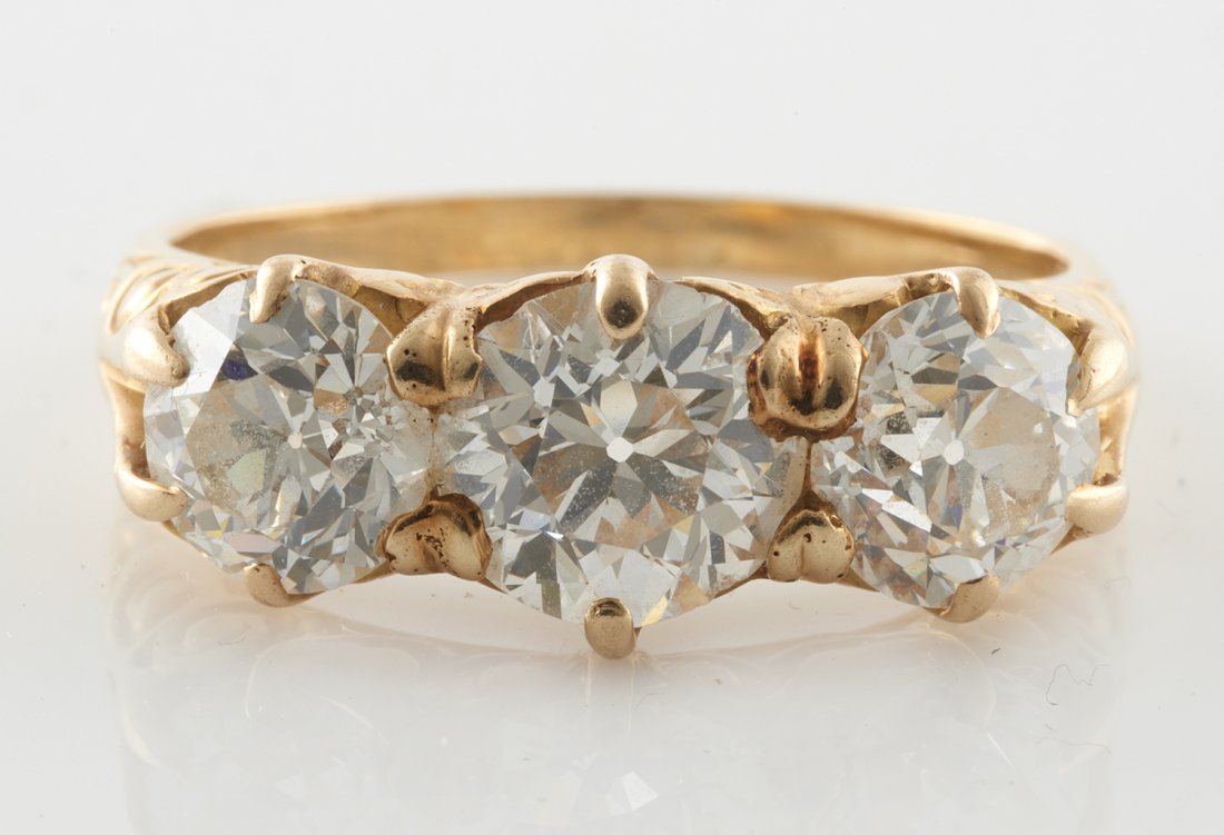 A diamond, 18k yellow gold ring (1 of 3)
