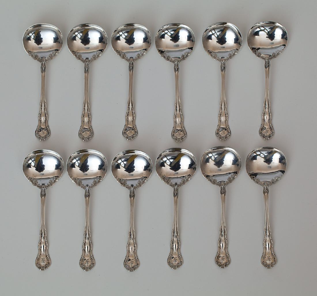 A sterling Wallace Irving set of twelve soup spoons: Wallace Silversmiths, Wallingford, CT, Irving, monogrammed: N, length 4 7/8 in; (5.70 oz.t.) [177.5 g.] Condition: Buffed.