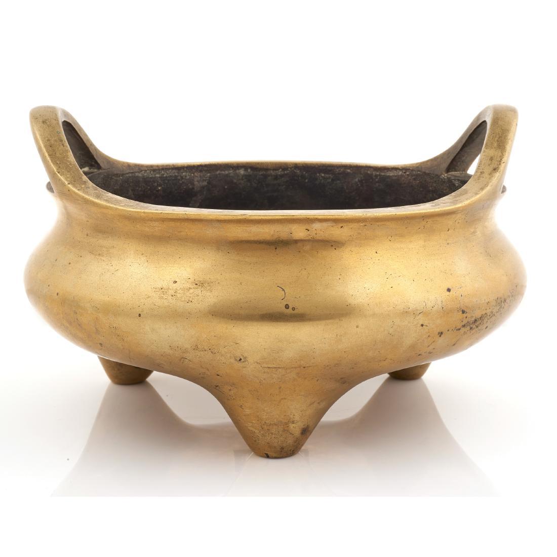 A Chinese bronze tripod censer (1 of 4)