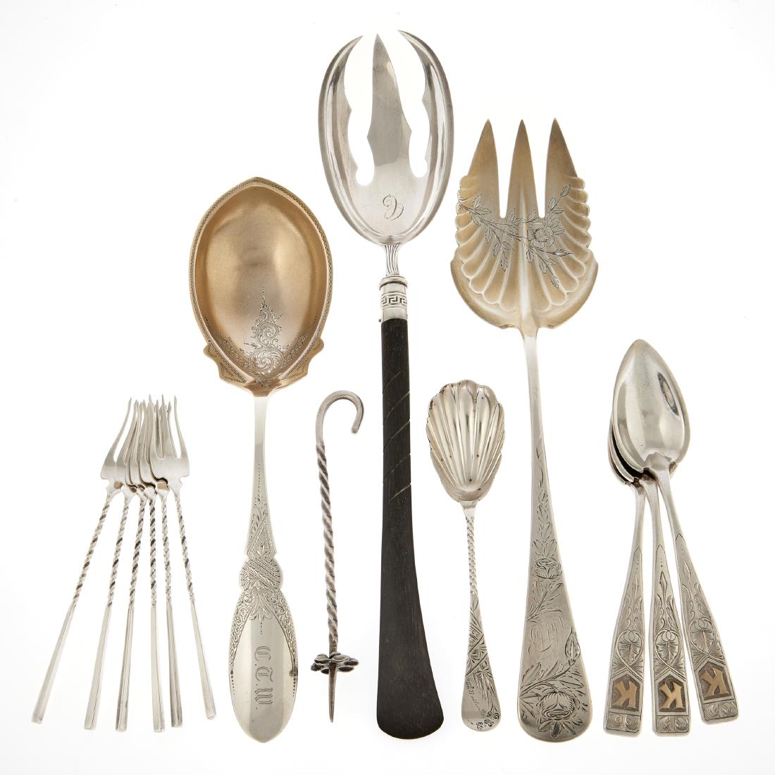 A group of sterling flatware with engraved decoration (1 of 2)