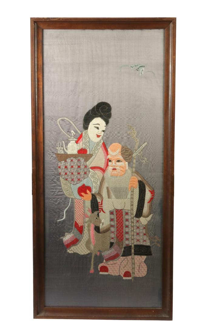 A large Chinese embroidered silk figural panel (1 of 3)