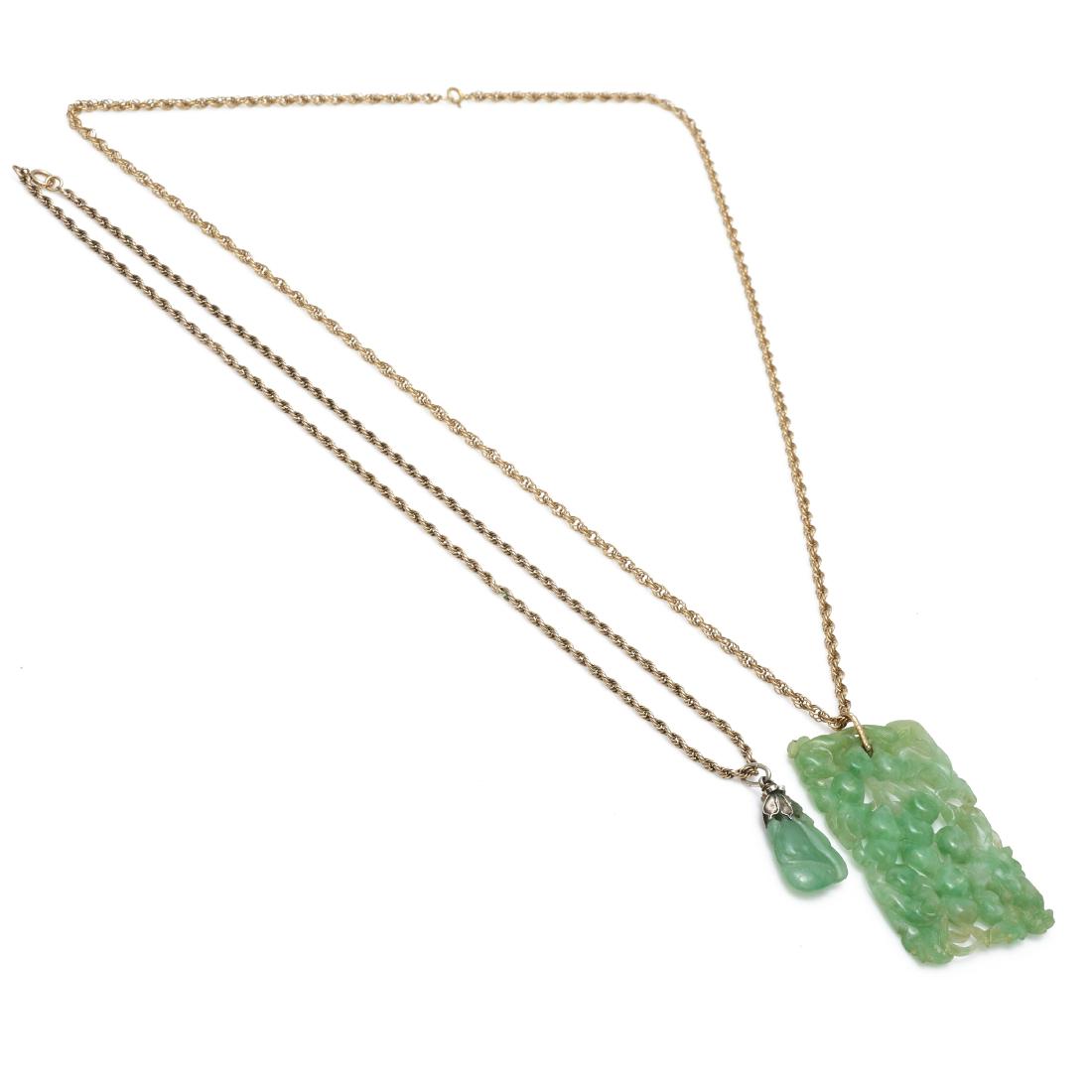 A collection of two jade, gold, silver necklaces (1 of 4)