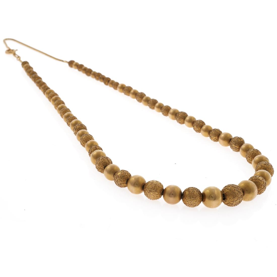 A Victorian gold bead necklace (1 of 3)