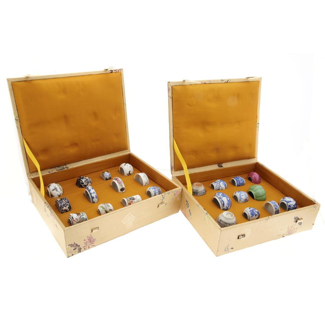 A collection of Chinese porcelain bird cage feeders (1 of 5)