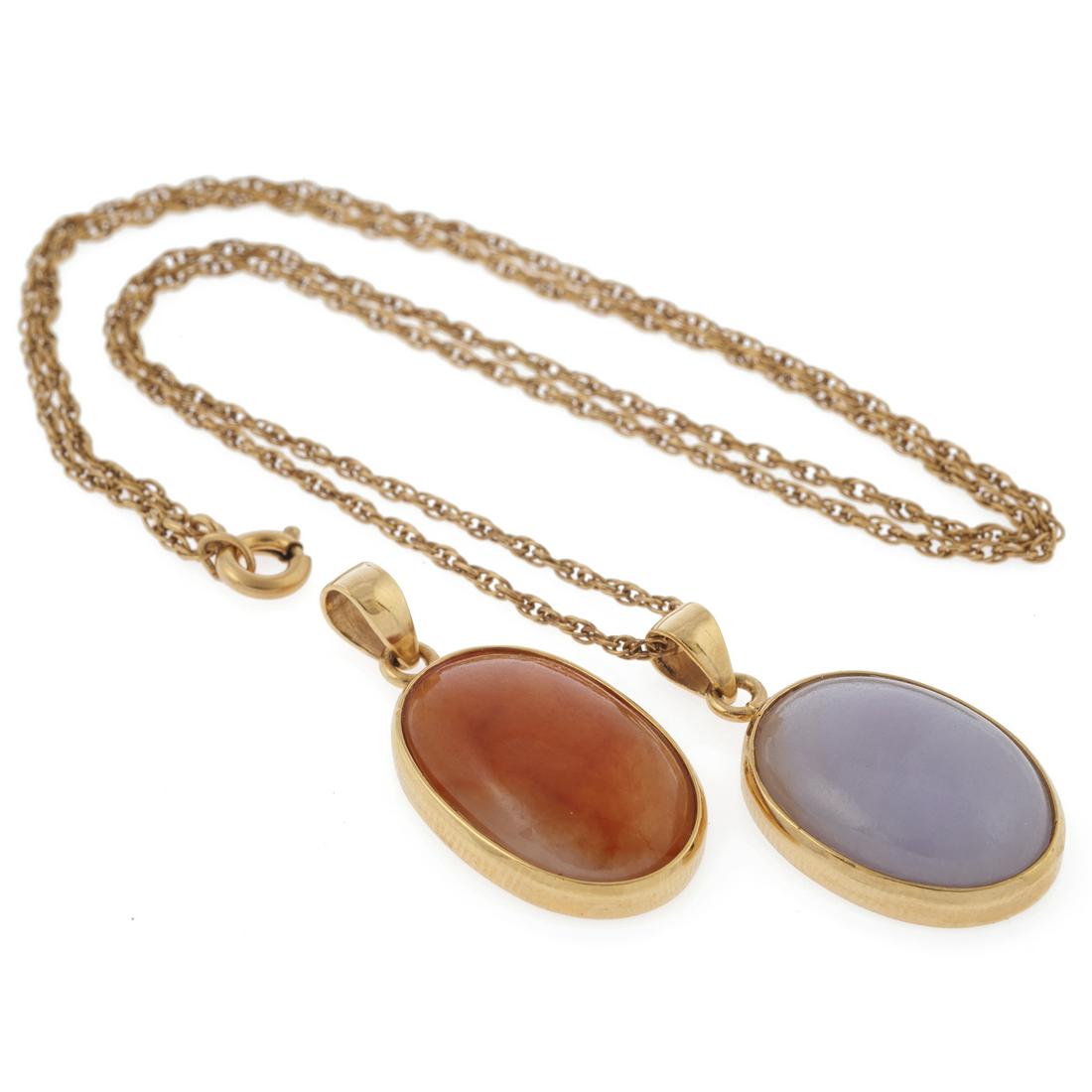 A collection of two jade, carnelian, 14k pendants (1 of 3)