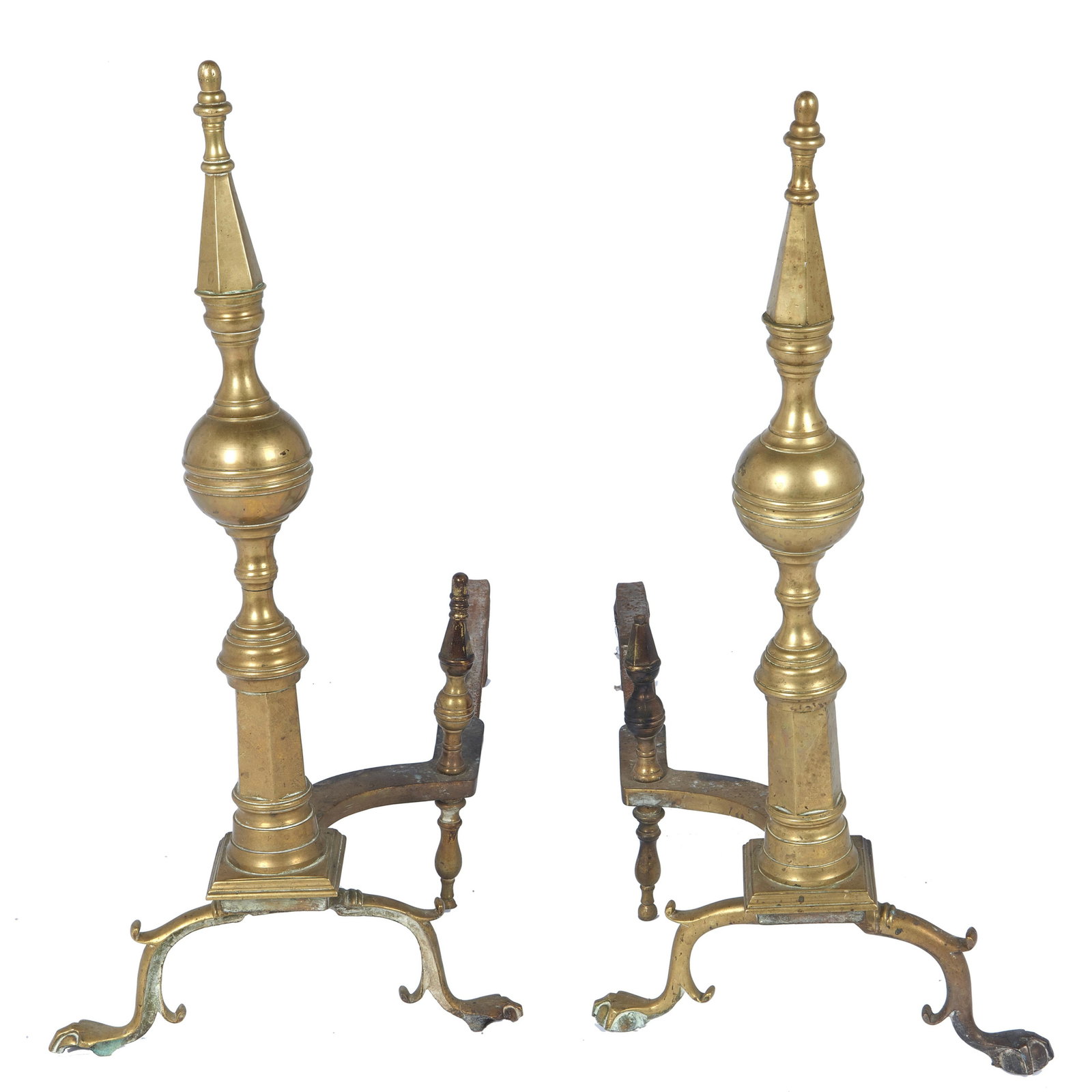 A pair of American brass andirons: 19th Century of bold steeple spire form. 19in. (48cm) h