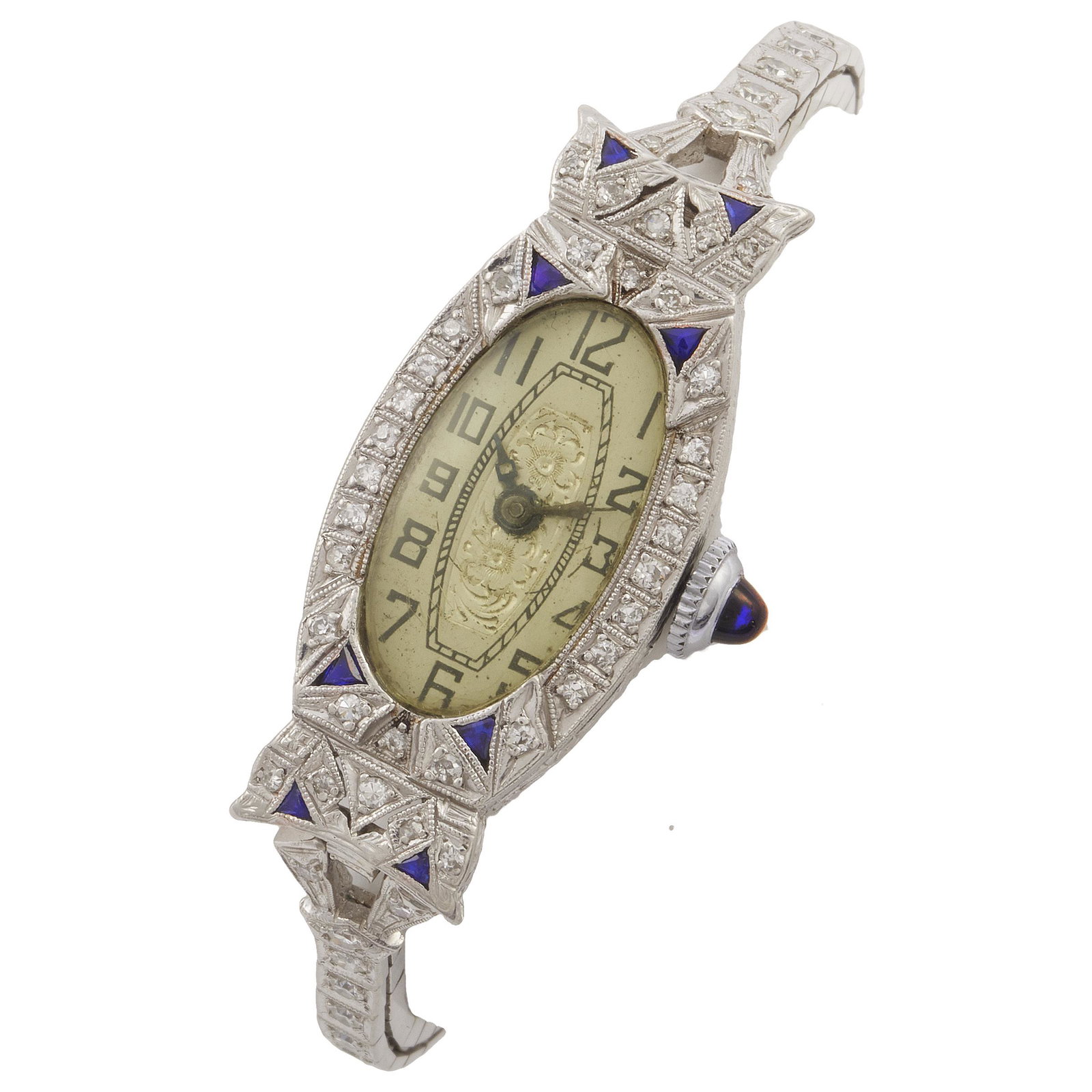Art Deco Diamond, Platinum, Synthetic Sapphire: DIAL: Oval, textured, silvered, black Arabic numeral hour markers, blued cubist and moderne hands. MOVEMENT: Manual wind and set, seventeen (17) jewels, unadjusted, Vogt & Co., Swiss. CASE: Barrel, p