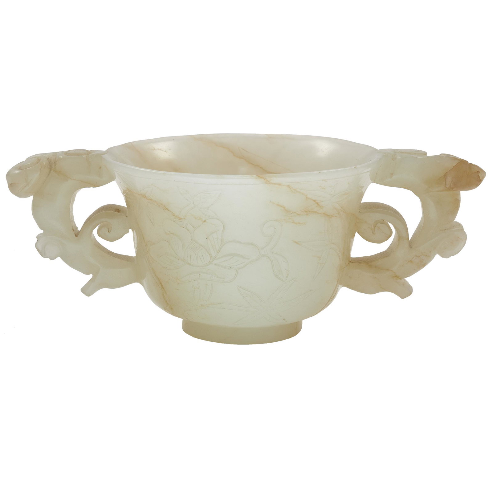 Jade Libation Cup, Ming Dynasty: Carved with lotus, prunus, bamboo and lingzhi to the exterior, the interior featuring orchids, flanked by a pair of lingzhi branch handles. Width: 4 7/8 inches