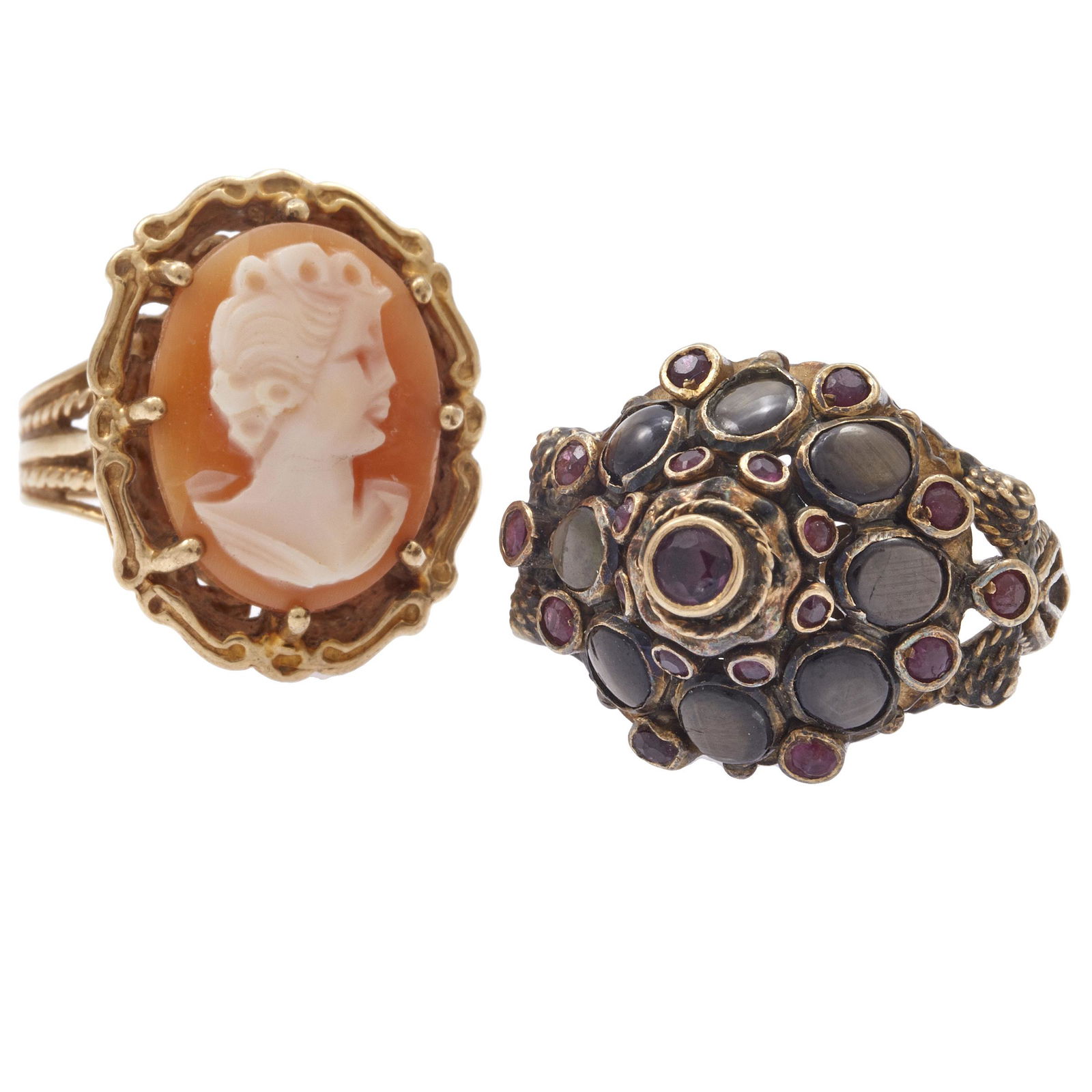 Collection of Two Rings: Including one oval shell cameo, set in a textured 10k yellow gold ring mounting, size 7; together with nineteen round-cut rubies measuring approximately 3.0 to 1.5 mm, accented by eight oval black sta