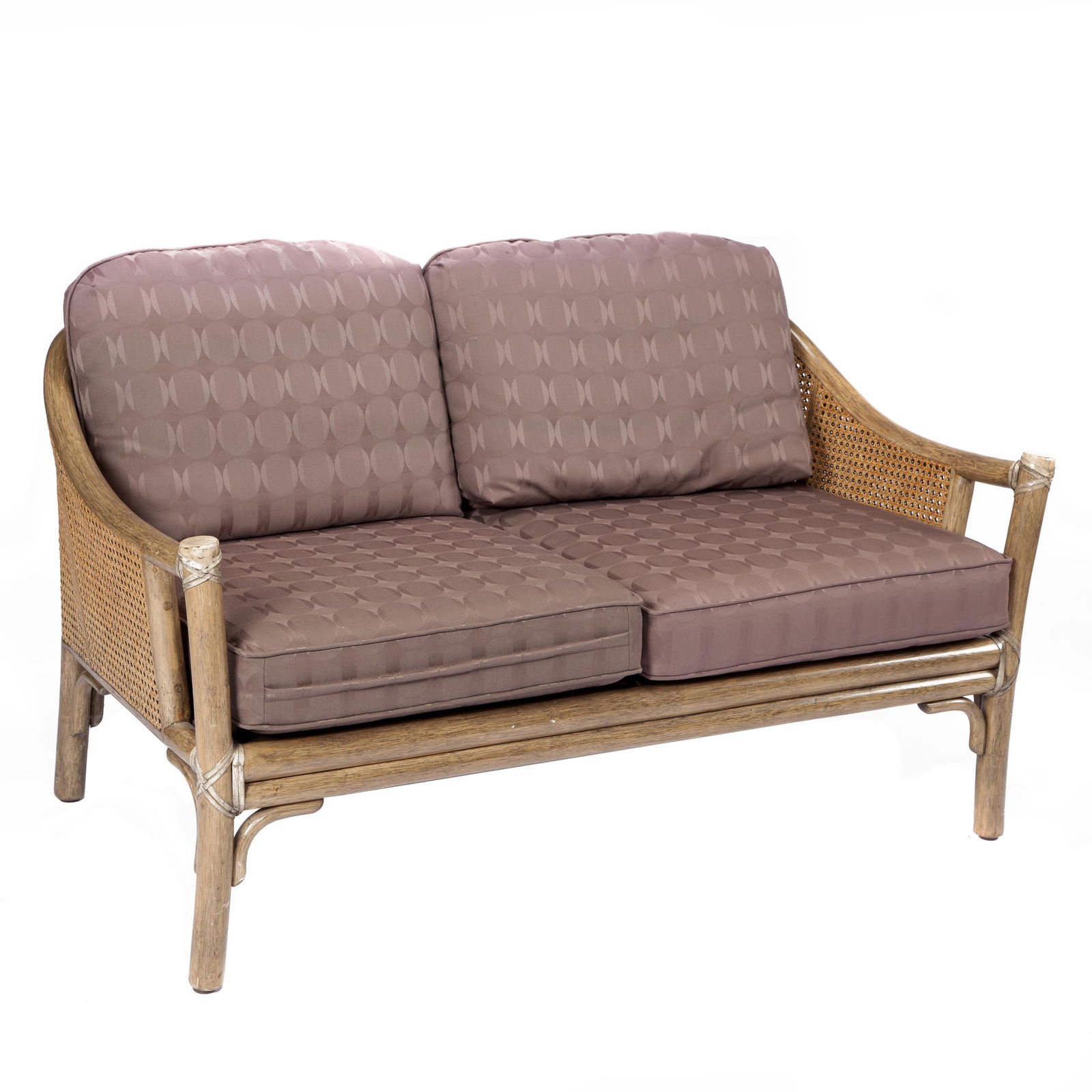 McGuire Settee: The bound rattan frame with caned back, overall tinted a moss green. 28in. (71cm) h 28in. (71cm) w 52in. (132cm) l