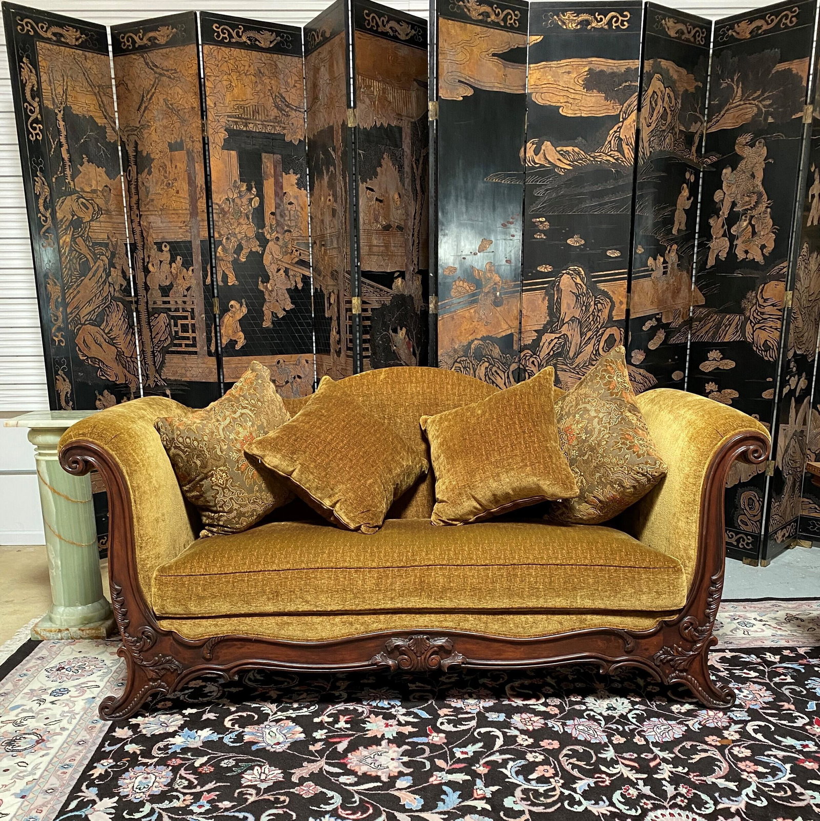Venetian Rococo Style Sofa: The rectangular seat beneath an undulating crest and over scrolled arms continuing to volute feet. 44in. (112cm) h. 35in. (89cm) w. 82in. (208cm)