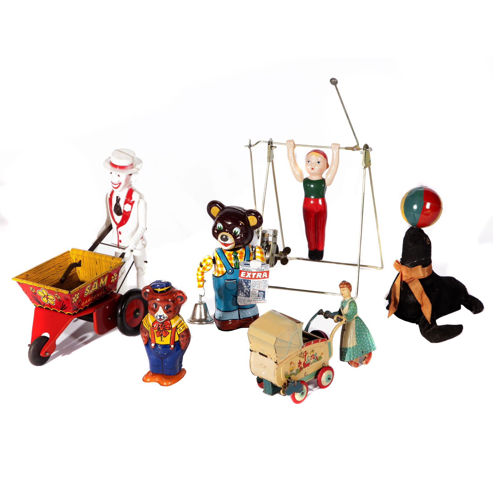 Six Misc. Theme Windup Toys (incl.Chein and others): Group of six toys doing various activities. Bear with bell and 'Animal Times' newspaper T.K. Toys Japan, Bear with hands in pockets J. Chein and Co., velvet Seal with ball Modern Toys MT Japan, Nanny