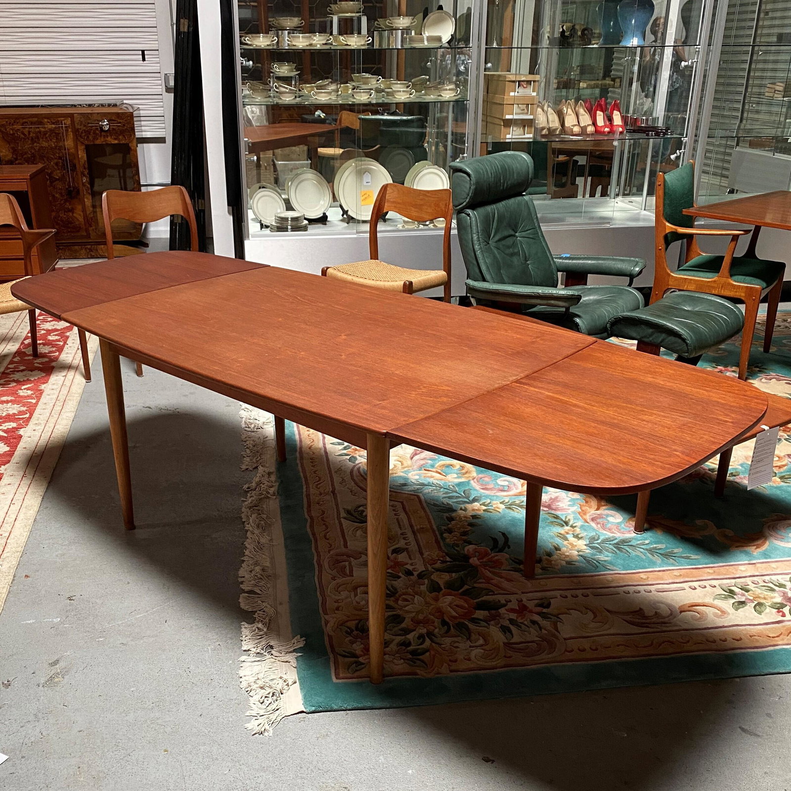 Kurt Ostervig Designed Danish Draw Leaf Dining Table: Wonderful Mid-century dining table, Kurt Ostervig design for Mobelfabrik, Denmark, with two additional leaves. Condition: fair to good, signs of wear and use mainly on legs. Markings underneath r
