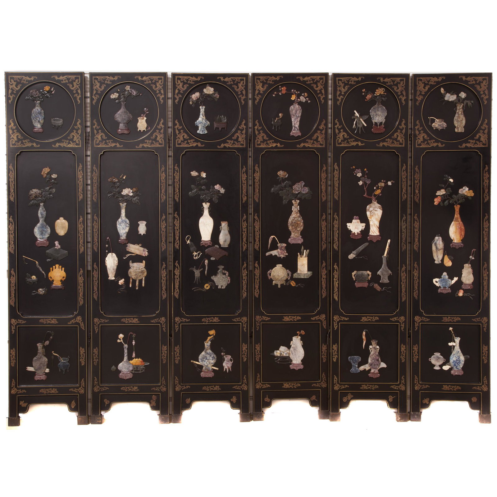 Six-Panel Lacquered Folding Screen, 20th Century: Decorated with soapstone inlay to depict antiques and flowers, all on a black lacquered ground with gilt floral scrolls. 72 x 96 inches