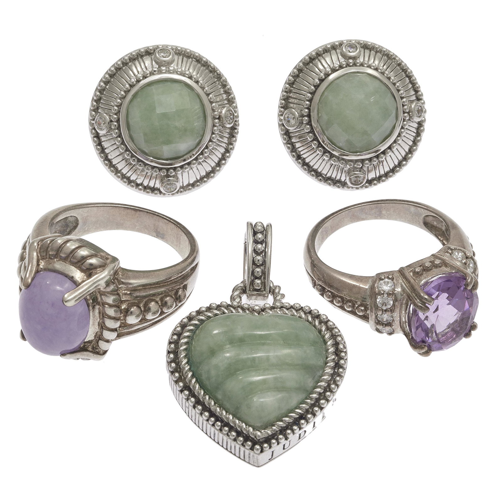Collection of Judith Ripka Jade, Amethyst Sterling: Including one ring centering one oval lavender jade cabochon set in a sterling silver mounting, size 9; one ring set with an oval-cut amethyst weighing approximately 4.70 cts., accented by ten round-c