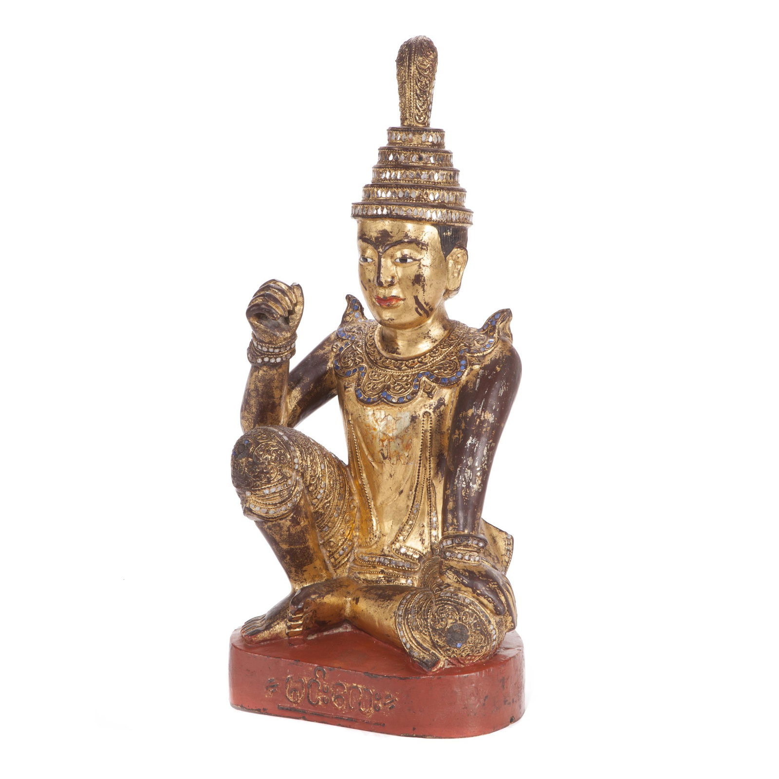 Southeast Asian Gilt and Lacquered Buddhist Figure,: Probably of Burmese origin, the religious figure is shown seated on a platform with his right arm raised and adorned in glass beads. Height: 23 3/4 inches